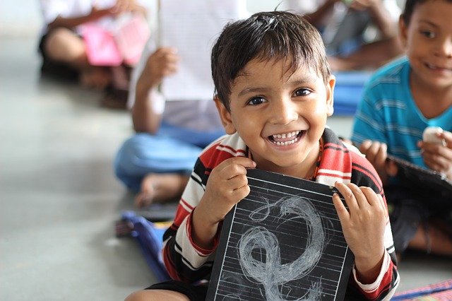 young boy in school